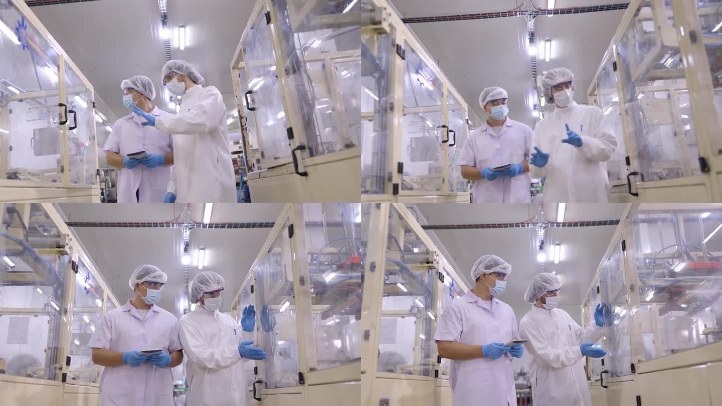 工程师或技术人员穿着防护服检查电子零件、食品产品或化妆品制造厂的机器准备情况。维护团队检查工厂的公用